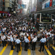 Anti-Occupy Central protesters stand behind a police cordon on Nathan Road at Hong Kong's Mongkok shopping district October 3, 2014,